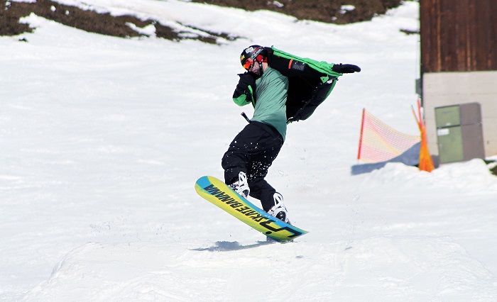 guy riding snowboard