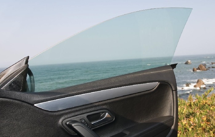 picture of an open car door window on the beach