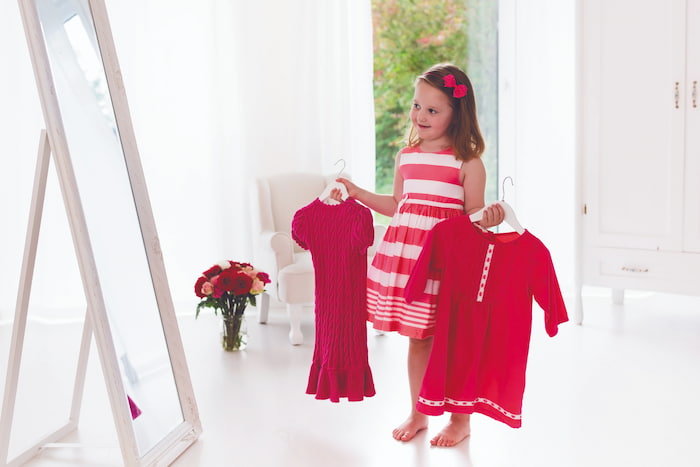 little-girl-choosing-dress