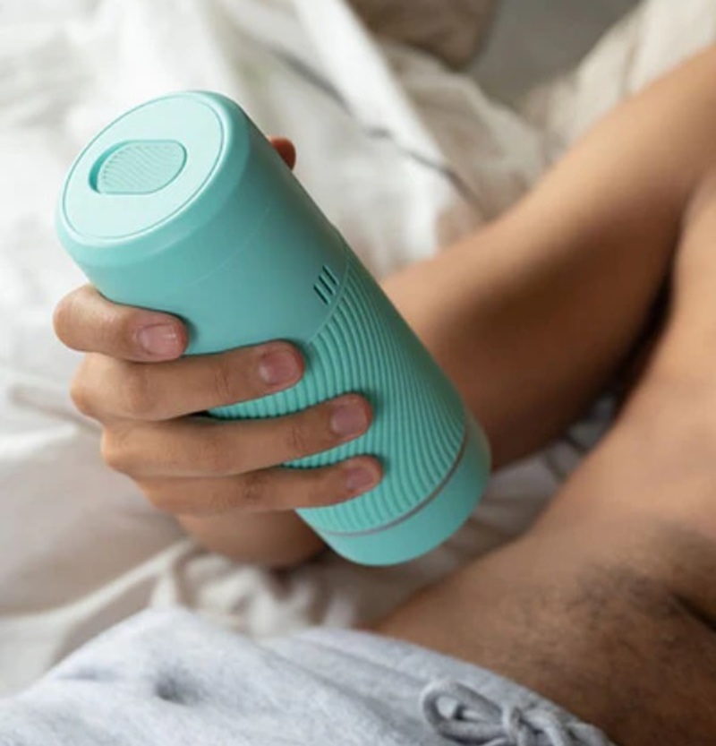 man holding adult toy