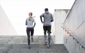 man and woman running