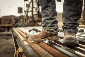 man with brown winter work boots