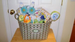 picture of a basket full of useful gifts for toddler