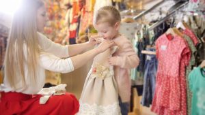 girl-with-mom-buying-dress