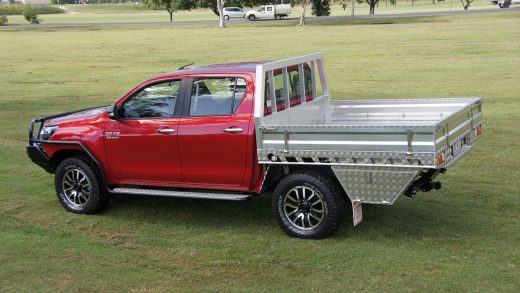 picture of red ute tray on grass surface