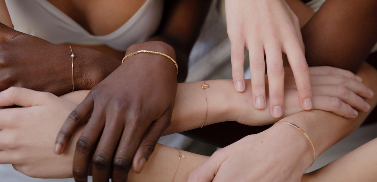 womens holding their hands with nordic style bracelets
