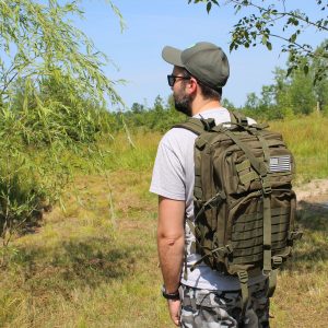Man wearing Tactical backpack