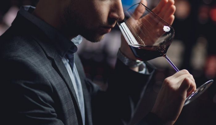 man_smell_red_wine