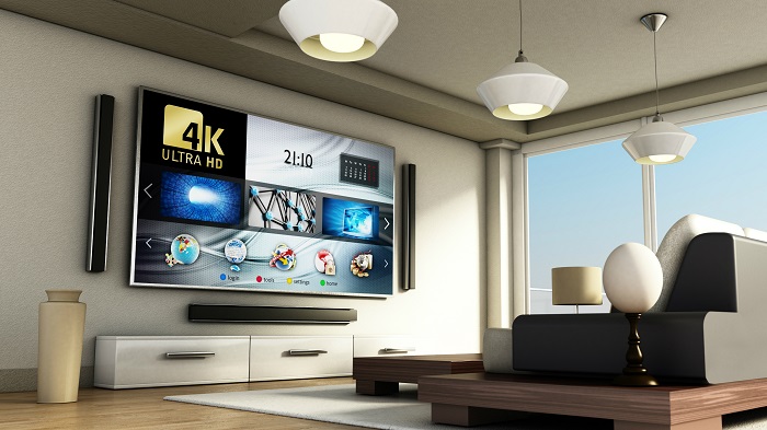 picture of a large smart tv screen with sound sistem 