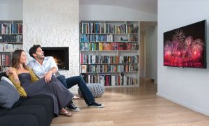 man-and-woman-enjoy-in-a-tv
