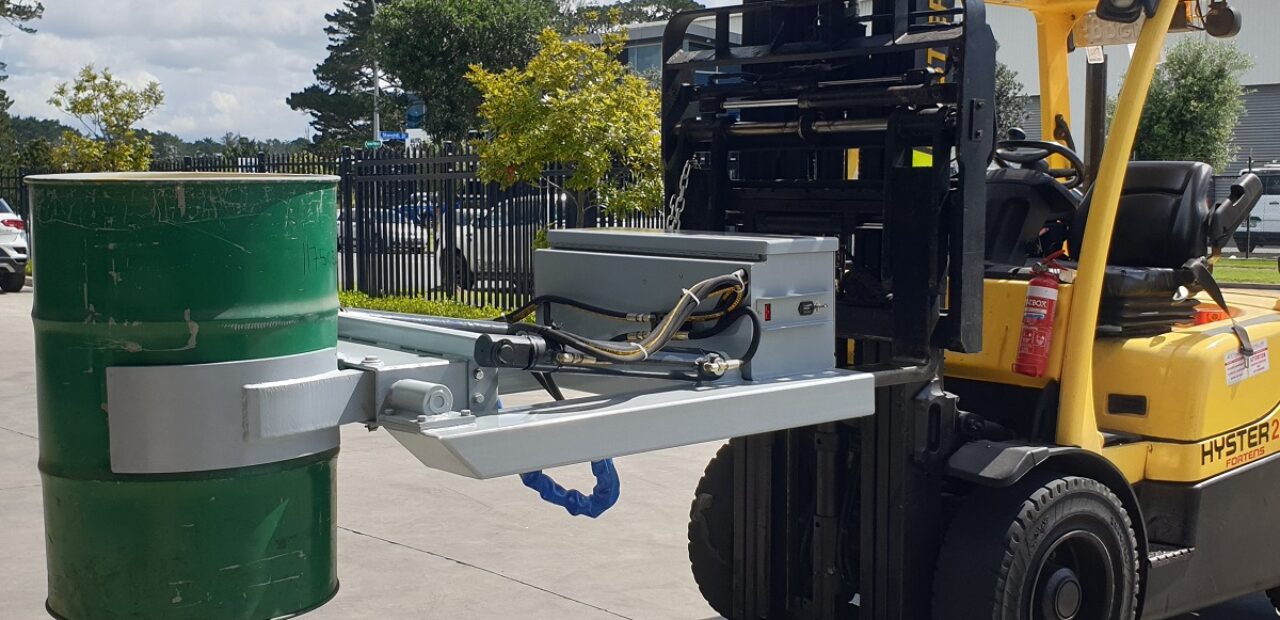 Forklift with drum rotator attachment