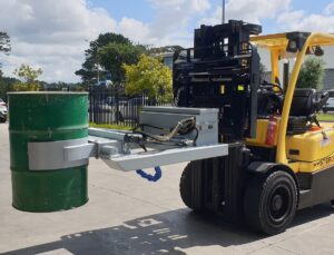 Forklift with drum rotator attachment