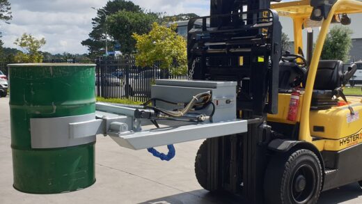 Forklift with drum rotator attachment