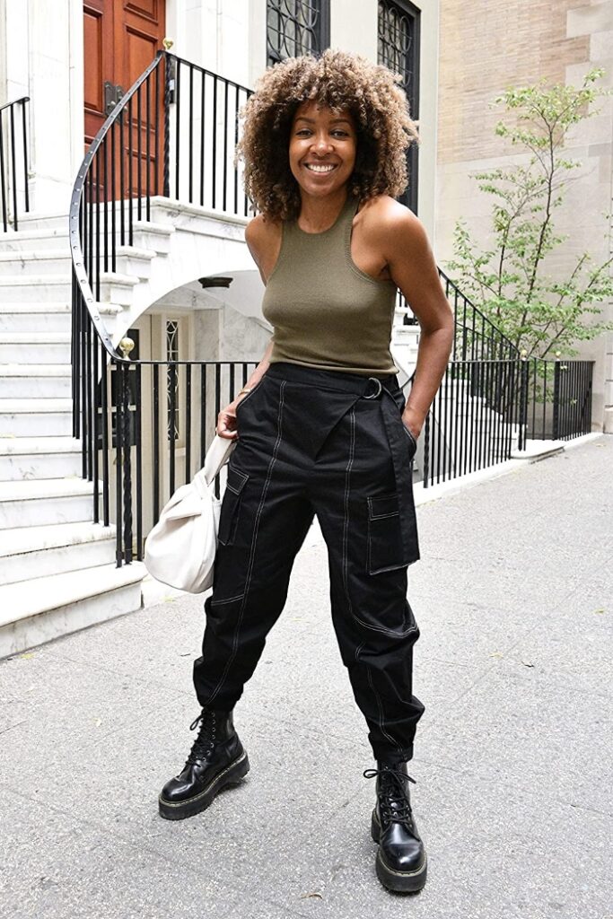woman wearing top and cargo pants