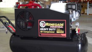 Renegade Industrial heavy-duty air compressor with a black horizontal tank and red detailing, positioned in a warehouse.