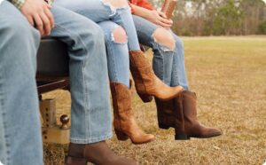 women wearing Ariat boots