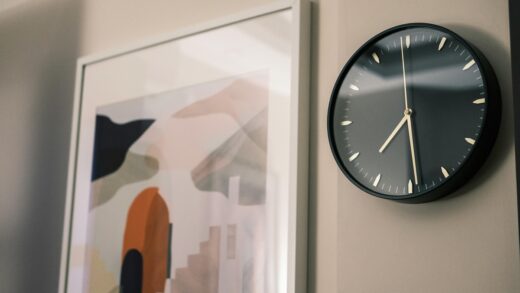 wall with art print and clock