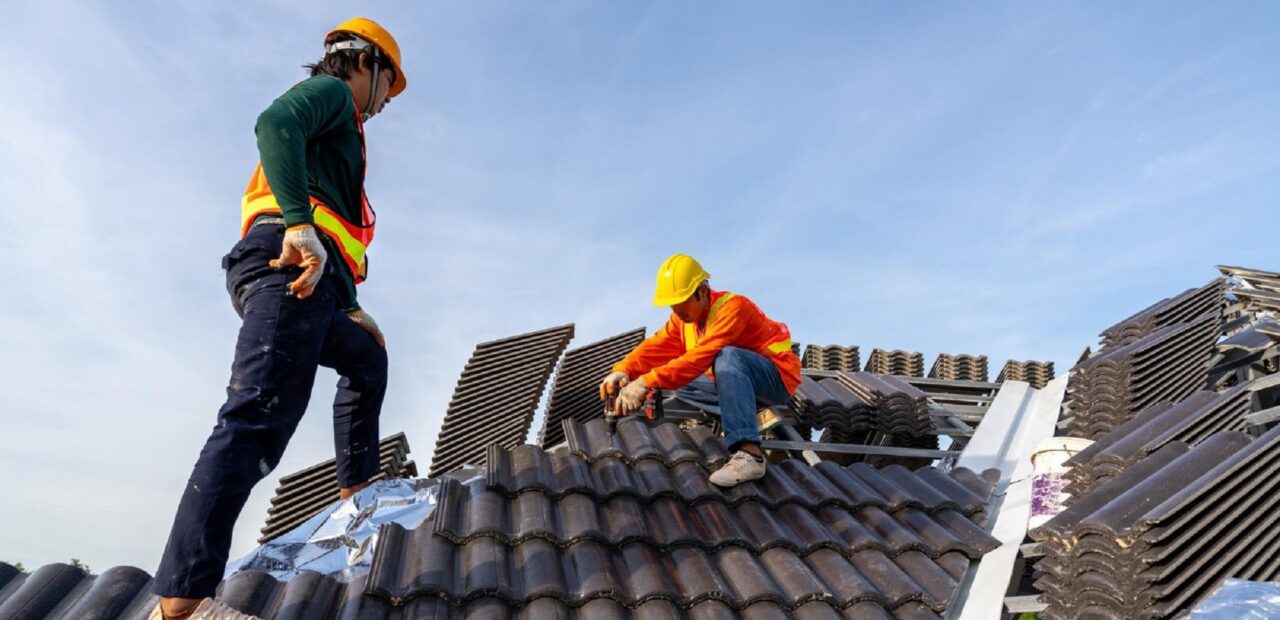 men on roof working