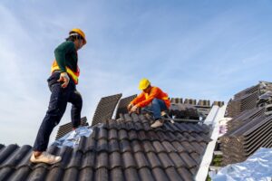 men on roof working
