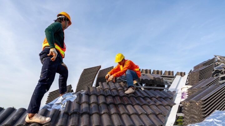 men on roof working