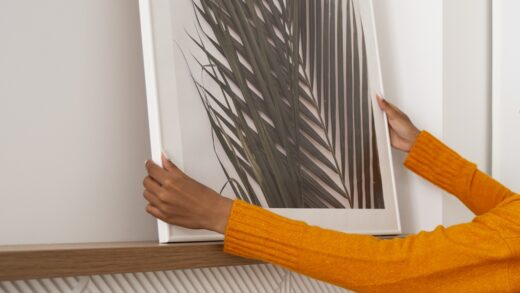 woman setting up a canvas print
